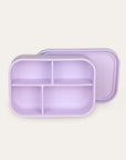 Purple divided lunch box on a light beige background