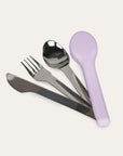Set of silver cutlery with a purple holder on a light gray background