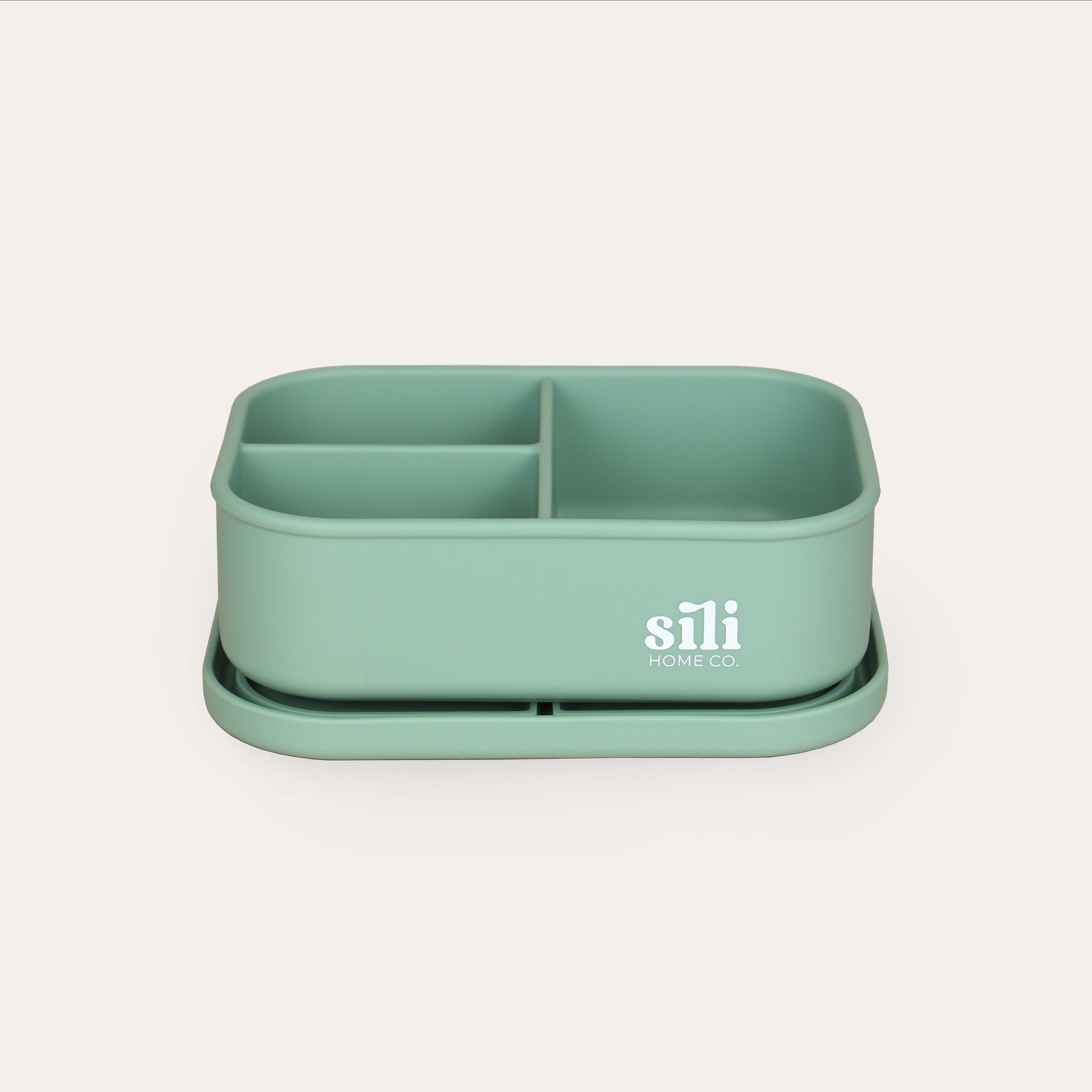 Mint green divided container with 'sili' branding on a light gray background